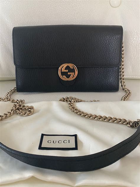 gucci interlocking wallet on chain|More.